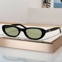 Amber frame green lens