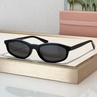 Black Gold frame grey lens