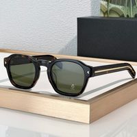 Amber frame green lens