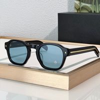 Black gold frame blue lens