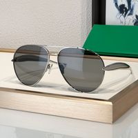 Silver frame grey lens