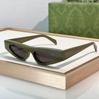 Green frame gray lens