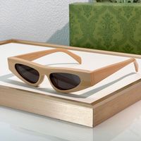 Pink frame grey lens