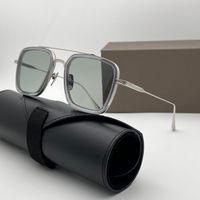 Grey silver frame light grey lens