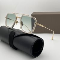 Clear gold frame gradient green lens