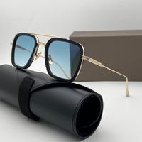 Black gold frame gradient blue lens