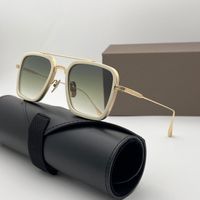 Beige gold frame gradient green lens