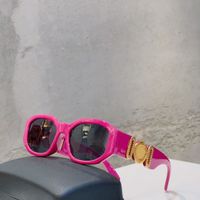 Purple gold frame grey lens