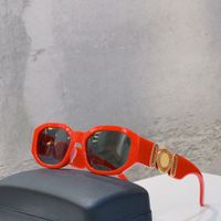 red gold frame grey lens