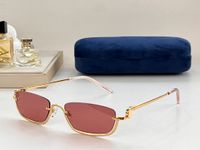 gold frame red lens
