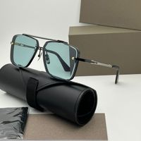 Black frame green lens