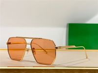 gold frame Orange lens