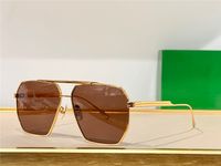 gold frame brown lens