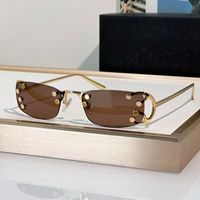 Gold-tea lens