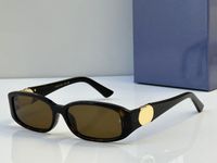 Amber frame brown lens