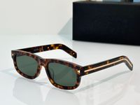 Amber gold frame green lens