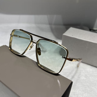 Gold frame gradient green lens