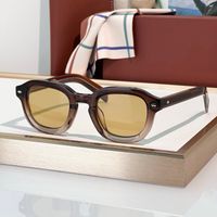 Clear brown frame yellow lens