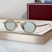 Green gold frame light green lens