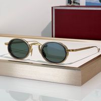 Amber gold frame green lens