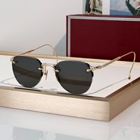 Gold-grey lens