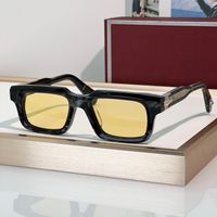 Gray texture frame yellow lens